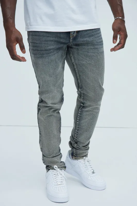 Lance Stacked Skinny Jeans - Dark Wash sold by Fashion Nova