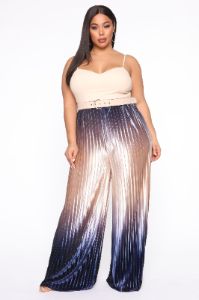 Waterfalling Velvet Jumpsuit - Ivory/combo sold by Fashion Nova