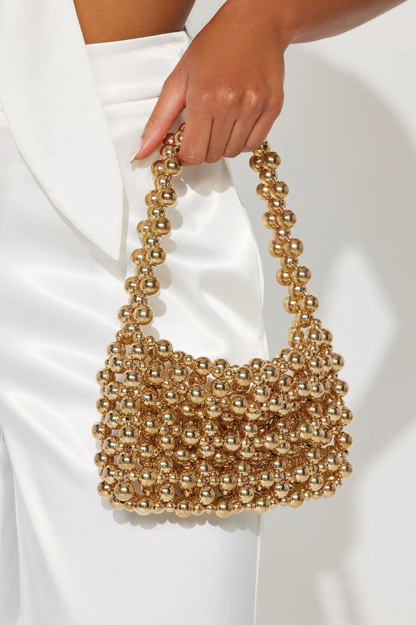 Double Bubble Fizz Handbag - Gold sold by Fashion Nova