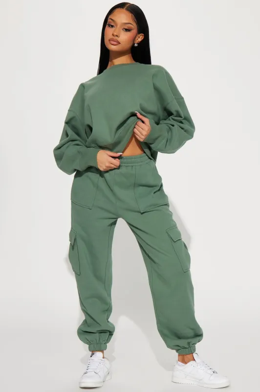 Follow Me Around Sweatsuit - Sage sold by Fashion Nova
