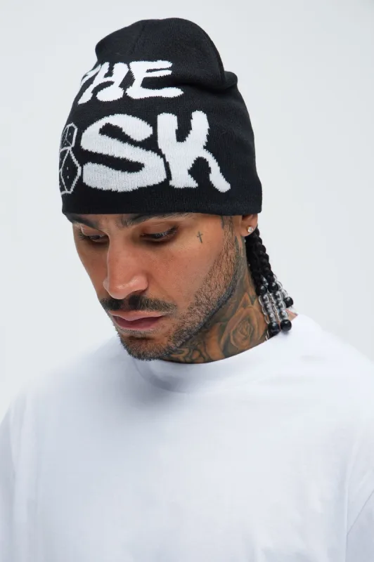 Worth The Risk Beanie - Black/White sold by Fashion Nova