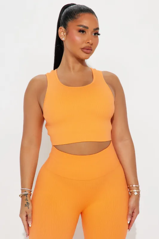 Beach Body Effortless Seamless Sports Bra - Tangerine sold by Fashion Nova