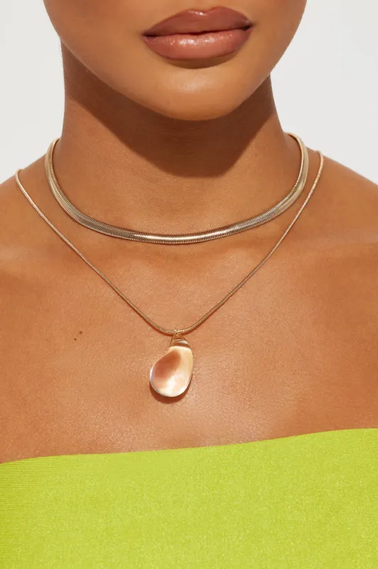 Saint Lucia Necklace - Clear/Gold sold by Fashion Nova