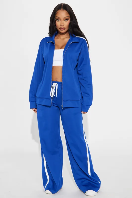 Lucca Oversized Track Pant Set - Blue sold by Fashion Nova