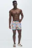 Grotto Mandarin Swim Trunks - Multi Color sold by Fashion Nova