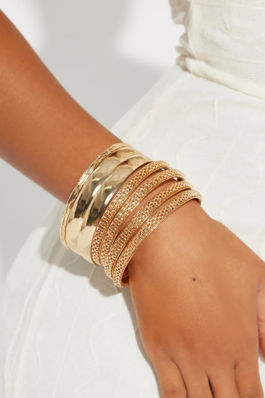 Del Mar Cliffs 8 Piece Bangle Set - Gold sold by Fashion Nova