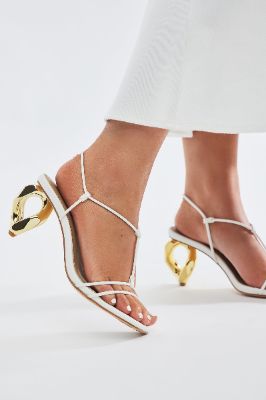 Run Wild Novelty Mules - White sold by Fashion Nova