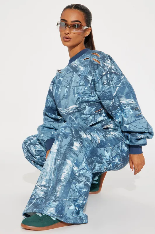 Stay Hidden Fleece Camo Pant Set - Blue sold by Fashion Nova