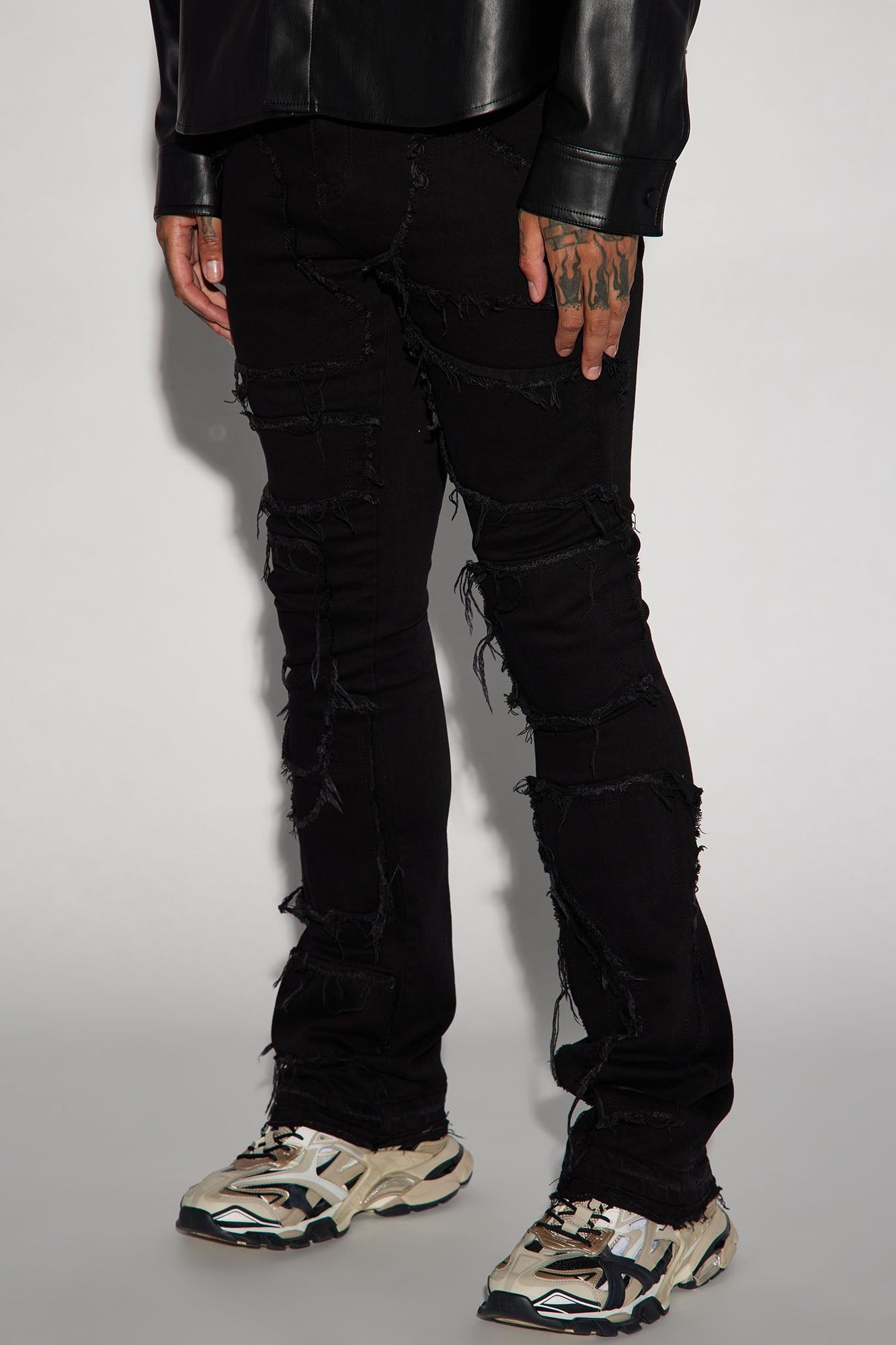 Patch It Up Stacked Skinny Flare Jeans - Black sold by Fashion Nova