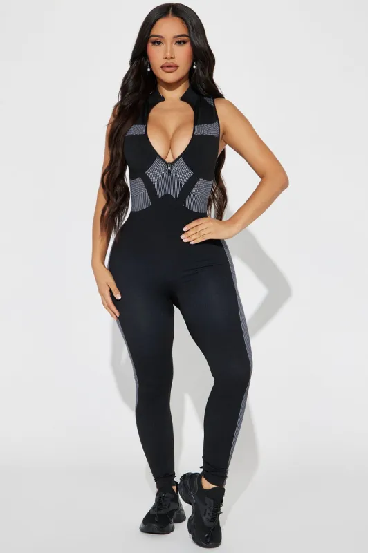 Trendy Feelings Active Jumpsuit - Black/White sold by Fashion Nova