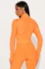 The Best Assets Textured Crop Active Jacket - Orange sold by Fashion Nova