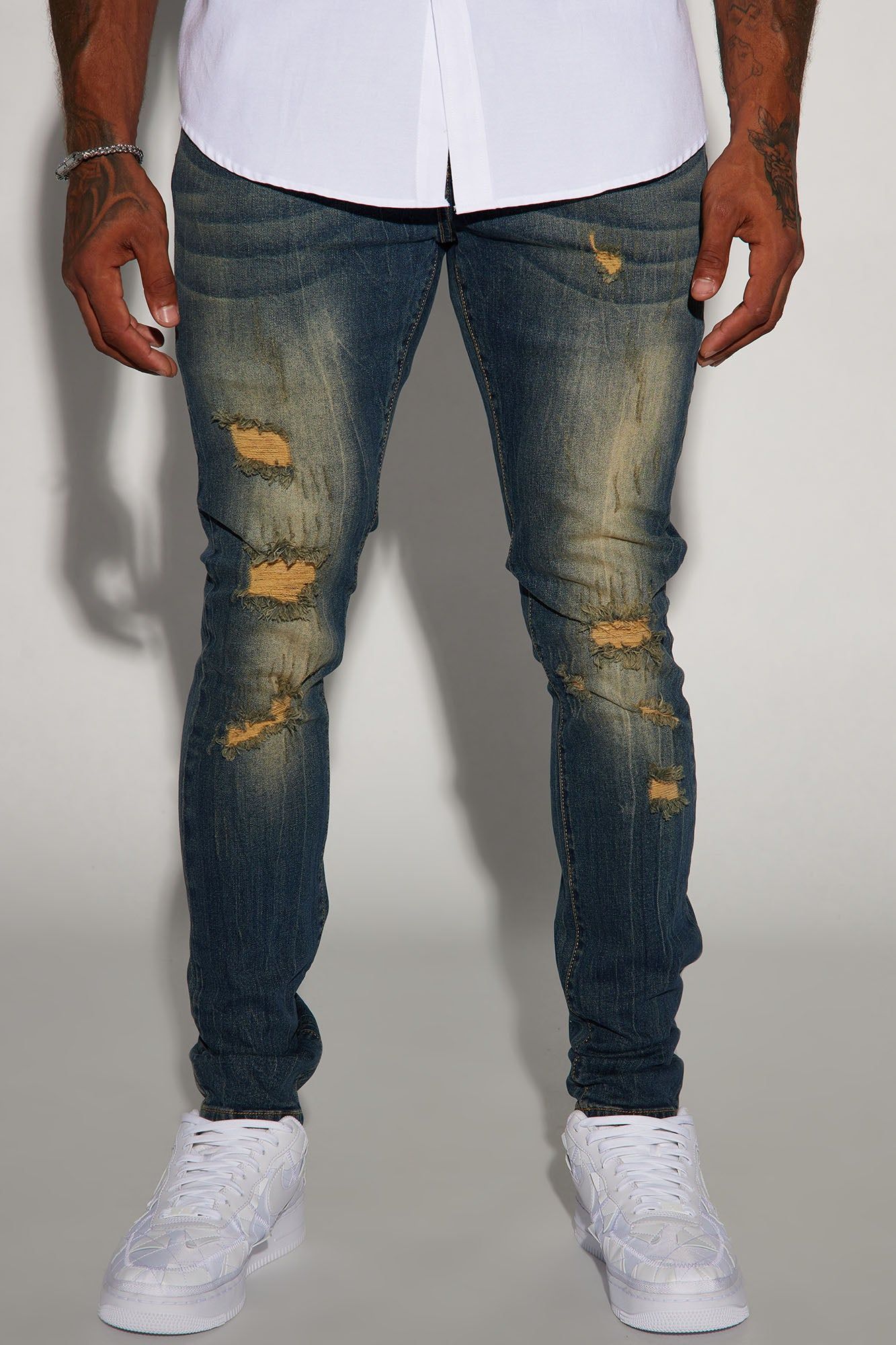 High Times Distressed Stacked Skinny Jeans - Vintage Blue Wash sold by Fashion Nova