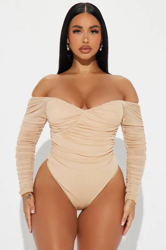 A Hot Mesh Bodysuit - Nude sold by Fashion Nova