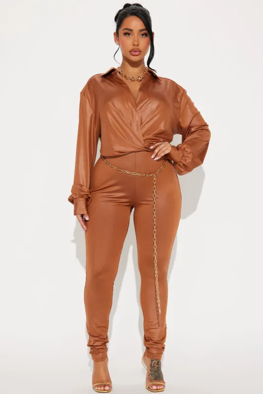 Jenni Belted Jumpsuit - Cognac sold by Fashion Nova