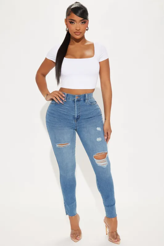 Applying The Pressure Stretch Ripped Skinny Jeans - Light Wash sold by Fashion Nova