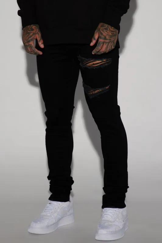 Nothing Compares Stacked Skinny Jeans - Black sold by Fashion Nova