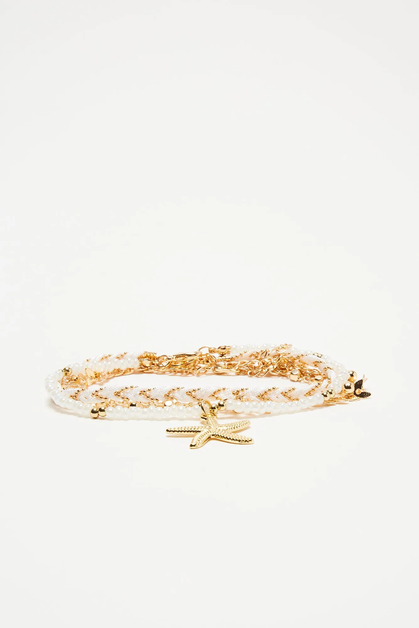 Salt And Sand 4 Piece Bracelet Set - White/Gold sold by Fashion Nova product image thumbnail 3