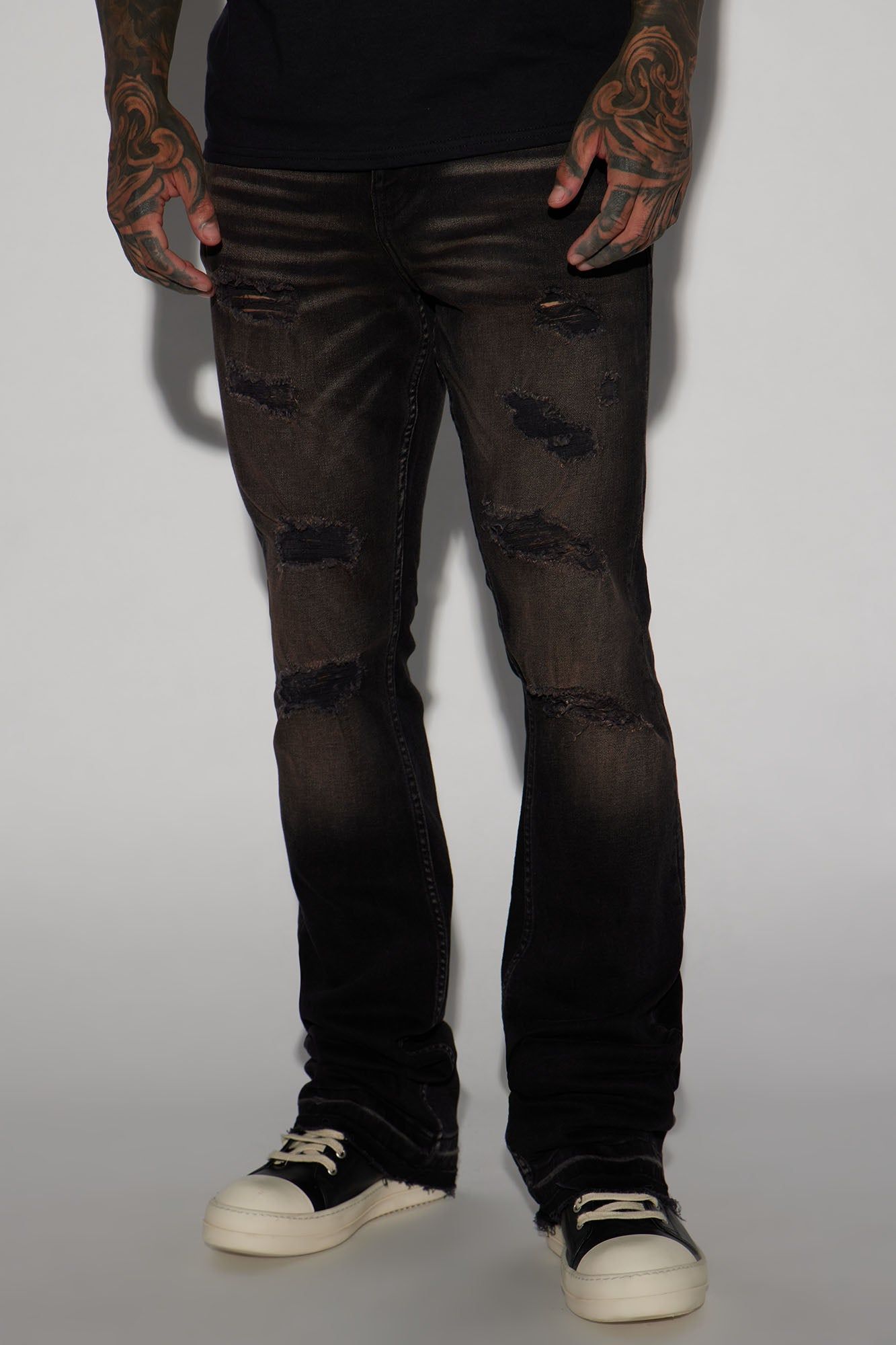 Nonchalant Distressed Stacked Skinny Flare Jeans - Black/Brown sold by Fashion Nova