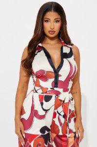 This Energy Jumpsuit  - Rust/combo sold by Fashion Nova