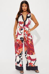 This Energy Jumpsuit  - Rust/combo sold by Fashion Nova
