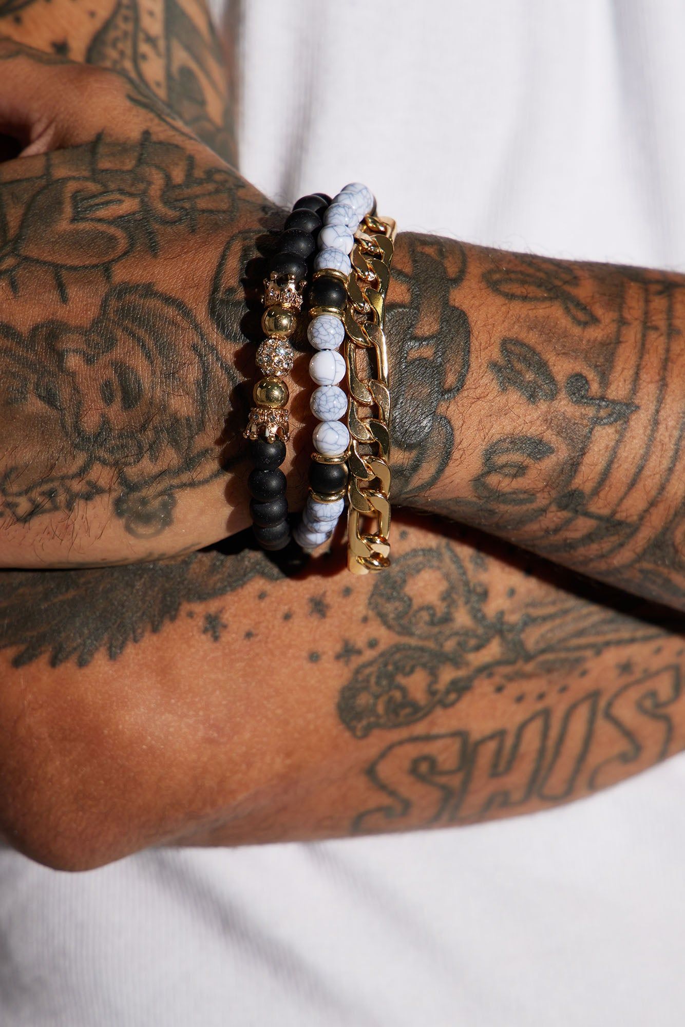 Primeval Bracelet Set - Black/Gold sold by Fashion Nova