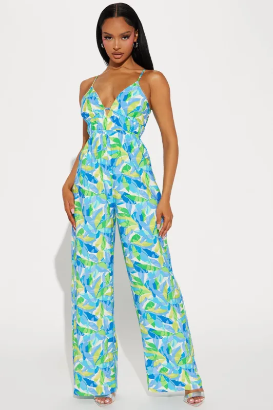Travel Memories Jumpsuit - Blue/combo sold by Fashion Nova