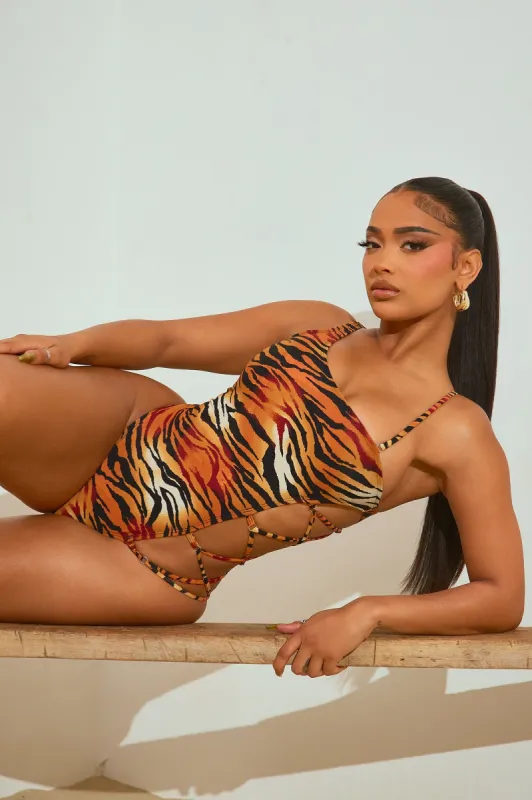 Sunny Side Lace Up Swimsuit - Orange/combo sold by Fashion Nova