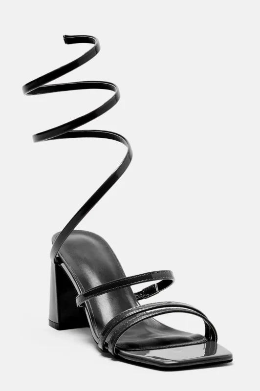 Cora Wrap Up Block Heels - Black sold by Fashion Nova