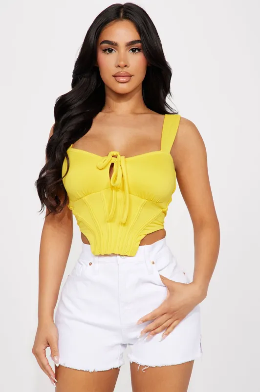 Jolene Corset Top - Yellow sold by Fashion Nova