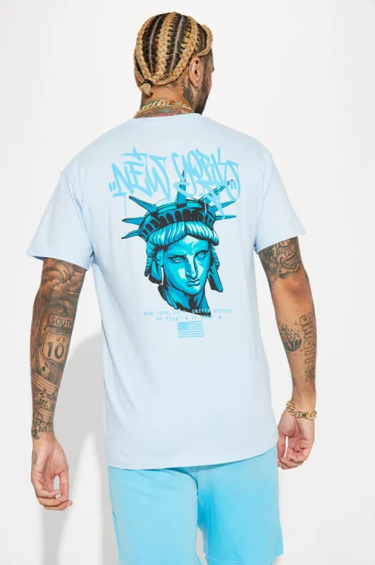 Freedom NYC Short Sleeve Tee - Light Blue sold by Fashion Nova