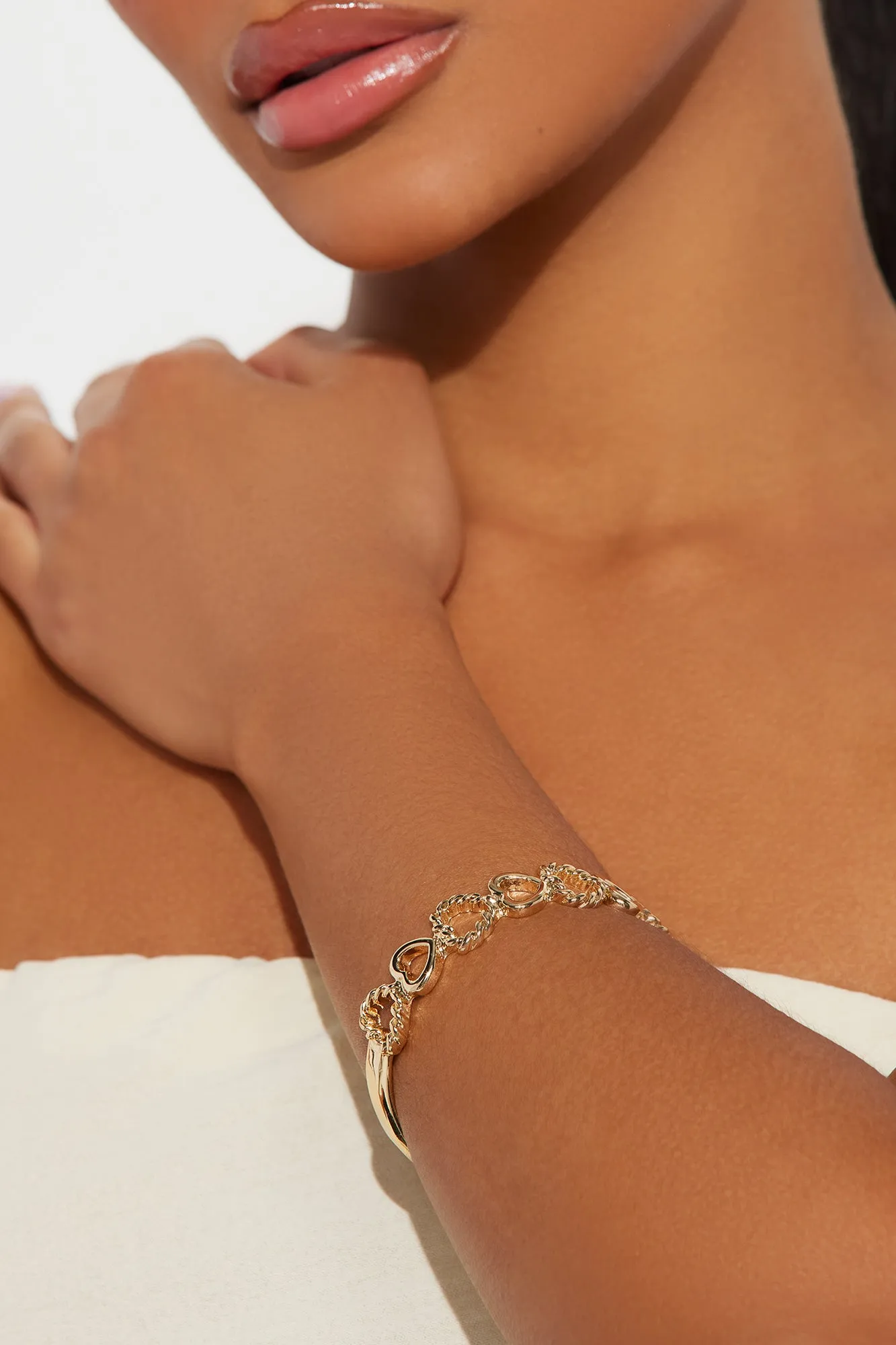 The Patterns Of Love Cuff - Gold sold by Fashion Nova