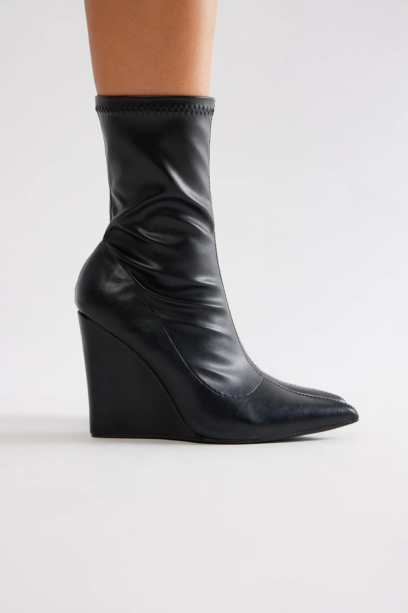 Looks Are Serving Wedge Booties - Black sold by Fashion Nova product image thumbnail 4