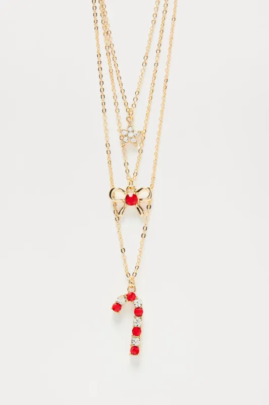 Santa's Candy Cane Necklace - Gold/Red sold by Fashion Nova