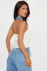 Delaney Denim Halter Sweater Top - Ivory/combo sold by Fashion Nova