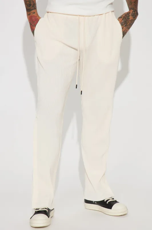 Turn Me Up Side Snap Plisse Pants - Cream sold by Fashion Nova