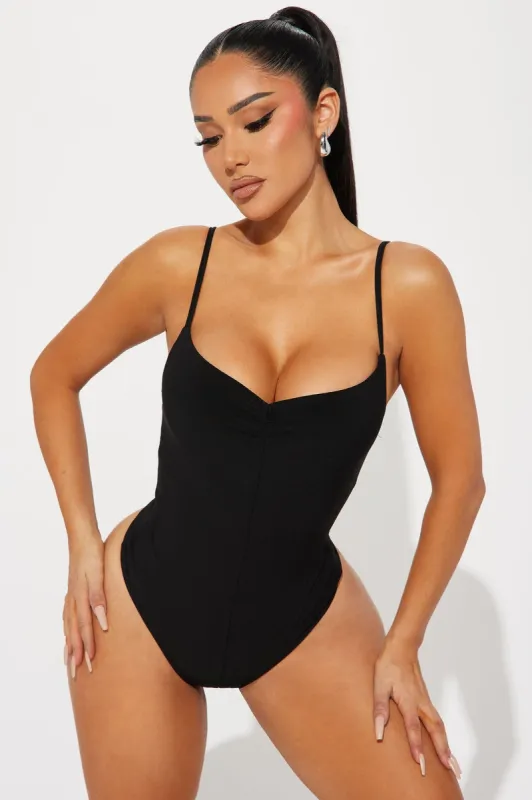 Sara Ruched Bodysuit - Black sold by Fashion Nova