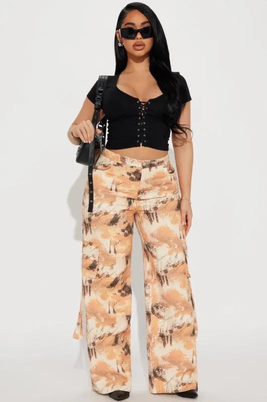 The New Standard Cargo Pant - Orange/combo sold by Fashion Nova