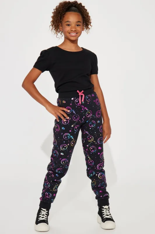 Mini Smiles All Around Fleece Joggers - Black sold by Fashion Nova