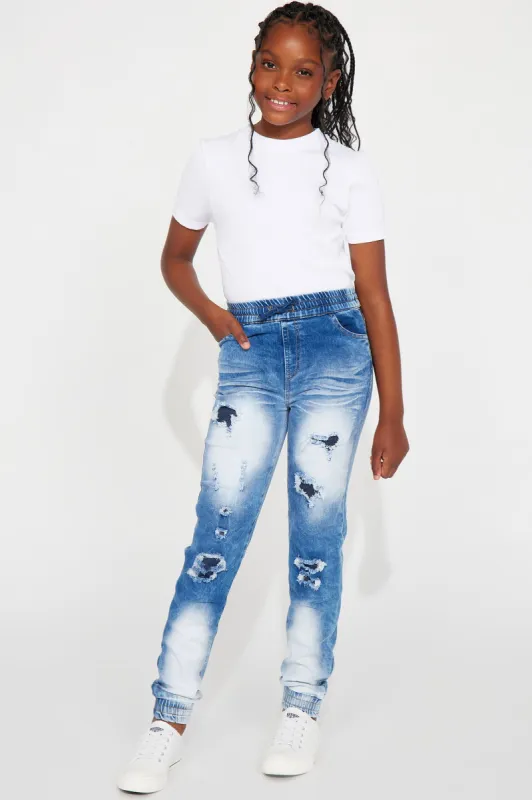 Mini Social Butterfly Distressed Denim Joggers - Medium Wash sold by Fashion Nova