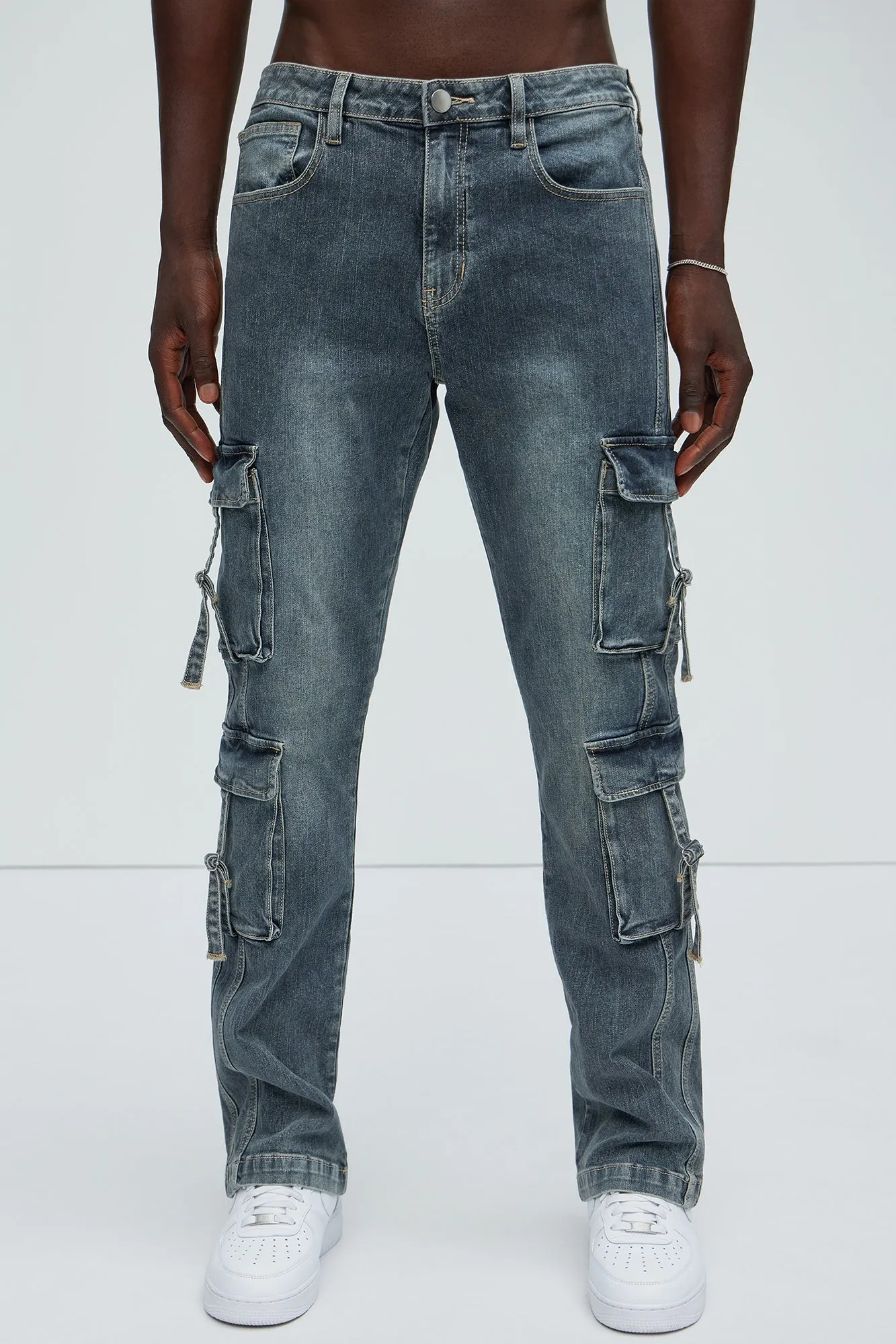 Patrick Stacked Skinny Flare Cargo Jeans - Dark Wash sold by Fashion Nova