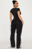 Carry Me Higher Fringe Jumpsuit - Black sold by Fashion Nova