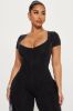 Carry Me Higher Fringe Jumpsuit - Black sold by Fashion Nova