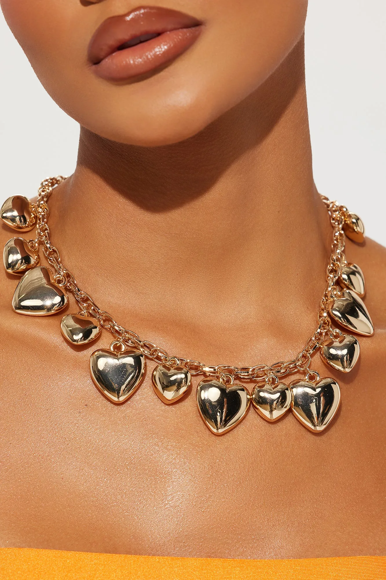 Cupid's Charm Necklace - Gold sold by Fashion Nova