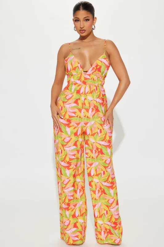 Travel Memories Jumpsuit - Red/combo sold by Fashion Nova