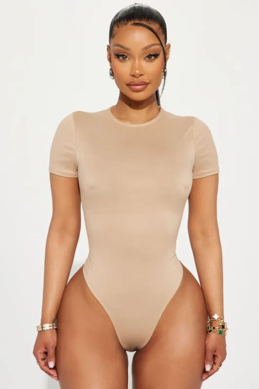 Feelin The Breeze Bodysuit - Tan sold by Fashion Nova