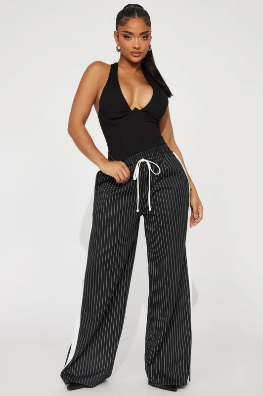 Want Nothing More Pinstripe Track Pant - Black/combo made by Fashion Nova
