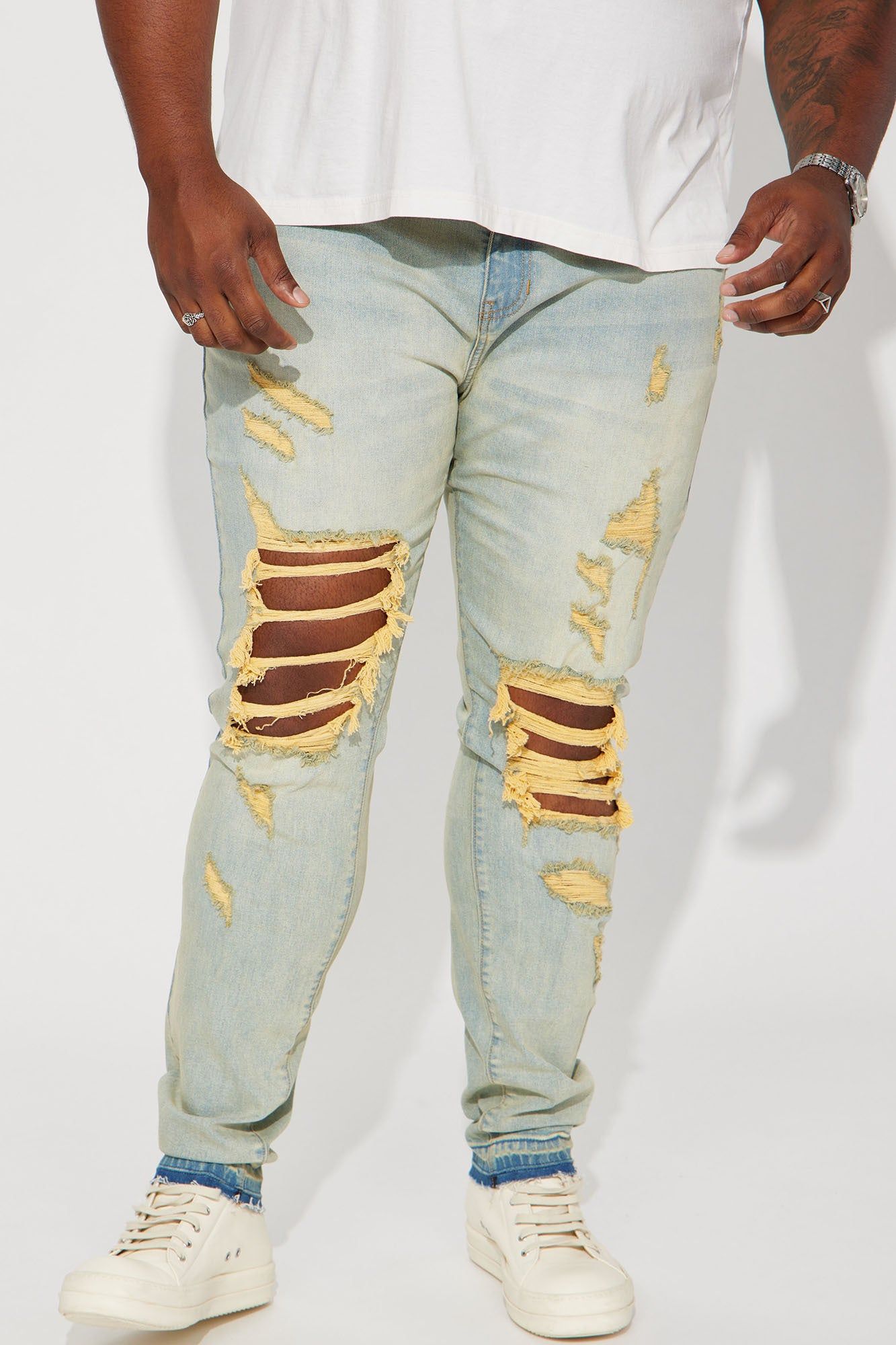 Pray For My Enemies Destroyed Stacked Skinny Jeans - Vintage Blue Wash sold by Fashion Nova