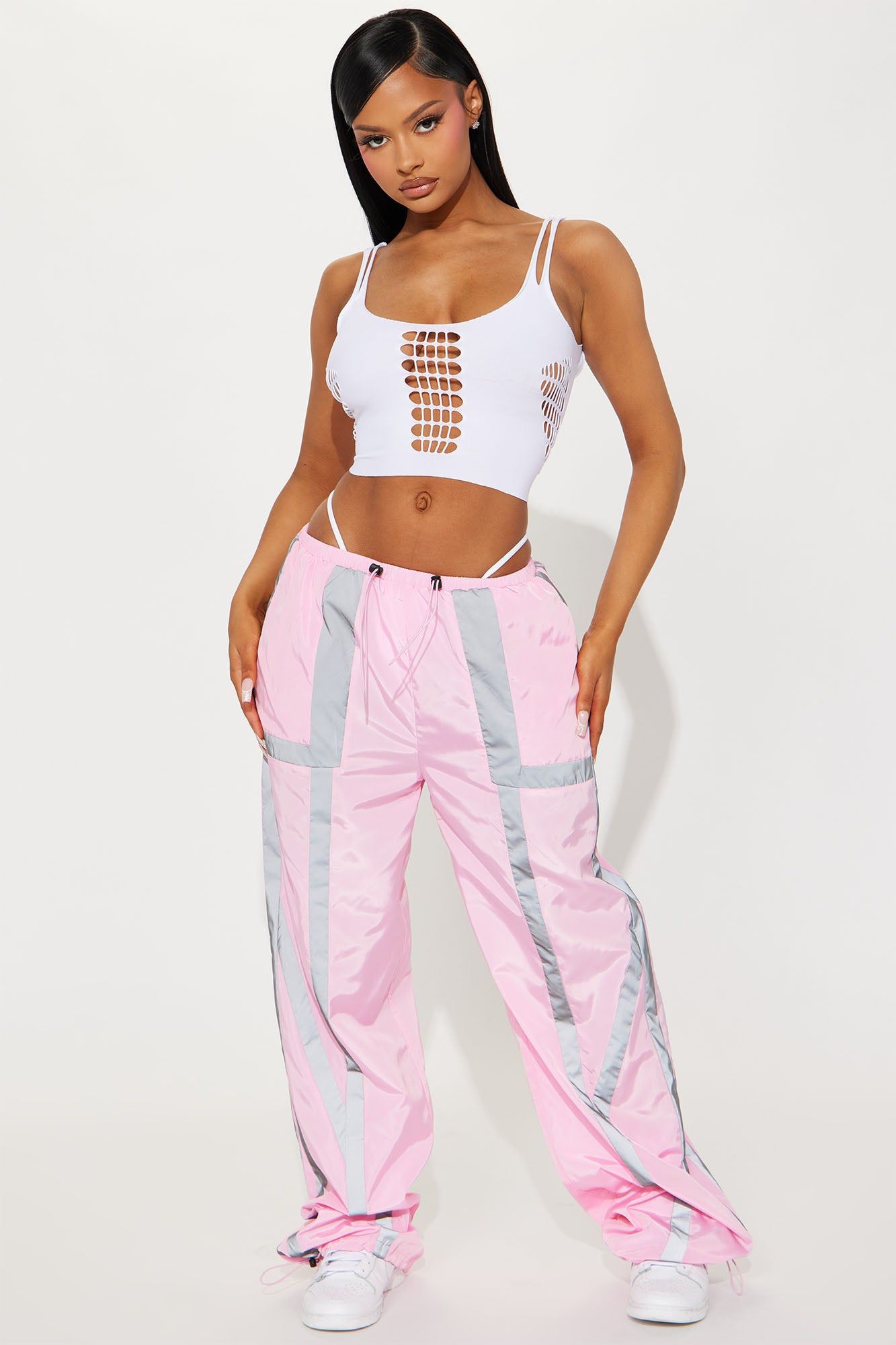 Kims Reflective Parachute Pant - Pink sold by Fashion Nova