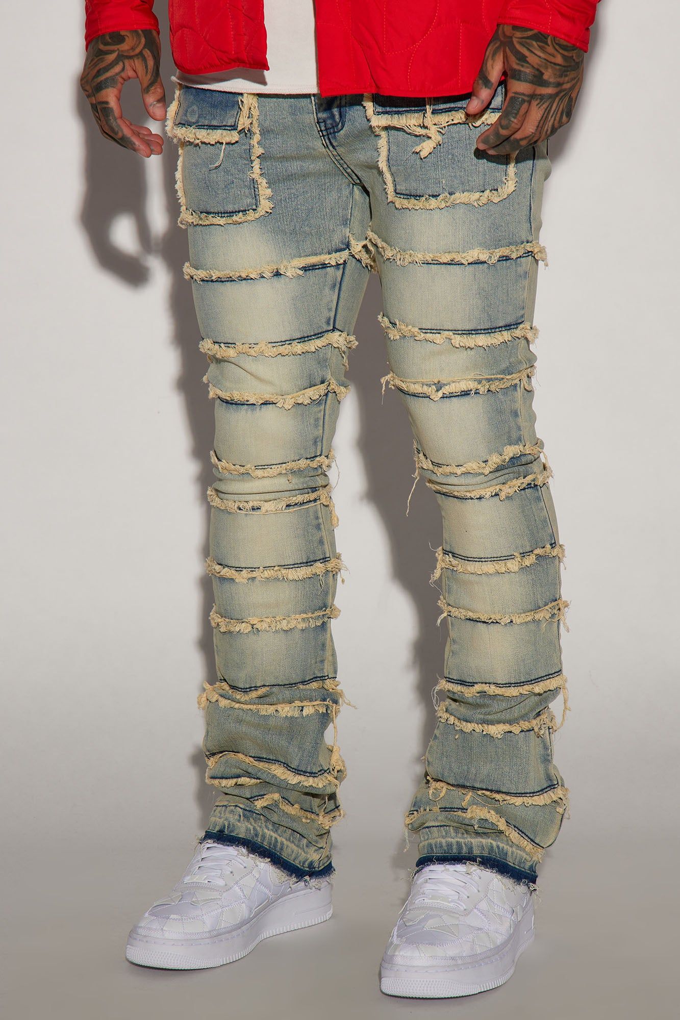 Keep It Going Fray Stacked Skinny Flare Jeans - Light Wash sold by Fashion Nova