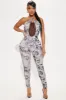 Dark and Dreamy Jumpsuit - Grey sold by Fashion Nova